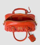 Miu Miu small Matelassé leather Arcadie top-handle bag - British product