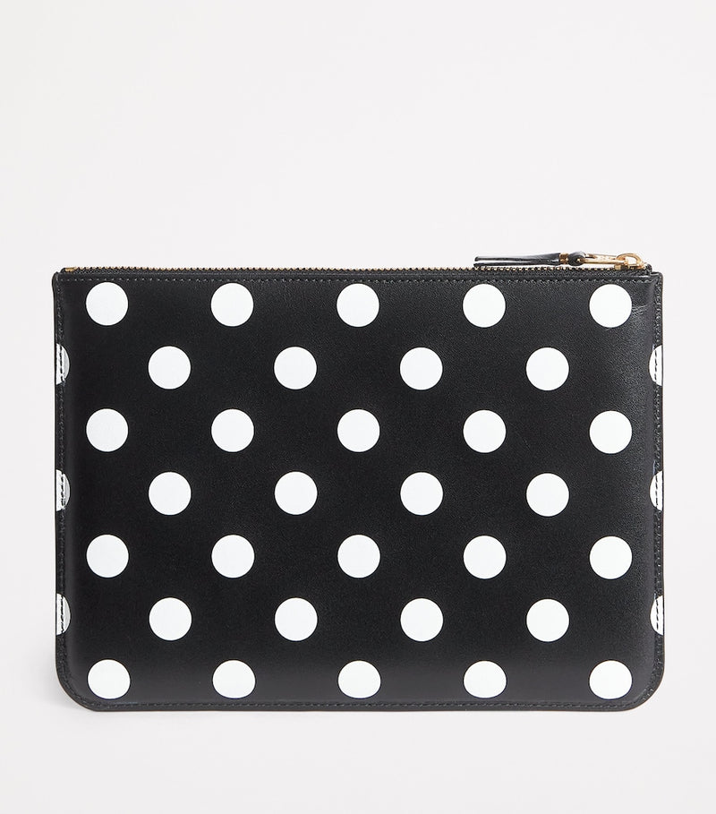 Comme Des Garçons large leather polka-dot zipped pouch, imported from the UK