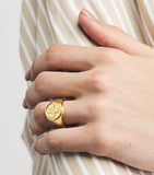 Tilly Sveaas gold-plated Moi + Toi signet ring (British brand)
