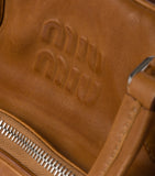 Miu Miu nappa leather top-handle bag with pockets (British brand)