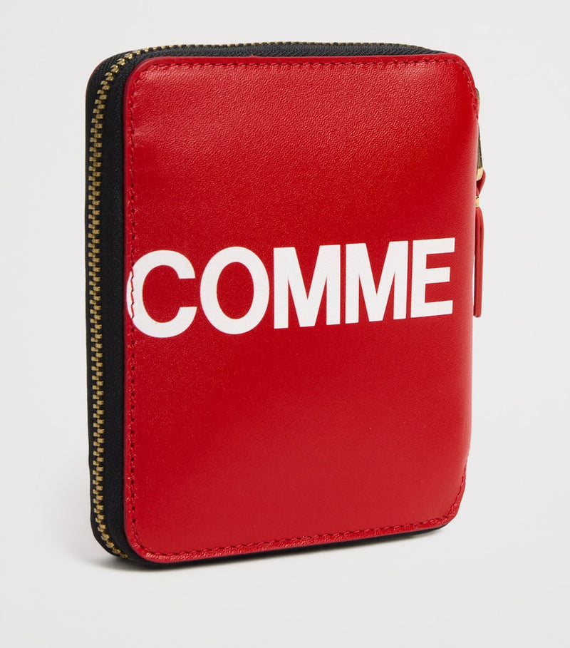 Comme des Garçons extra large logo zipped wallet, UK version