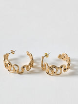 Next Oliver Bonas Gold Gladys Wavy Brushed Metal Hoop Earrings- Buy online at McGrocer