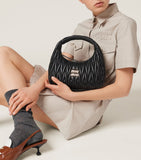 Miu Miu matelassé leather Wander top-handle bag (British brand)
