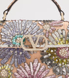 Valentino Garavani VSLING sequinned top-handle bag - British product