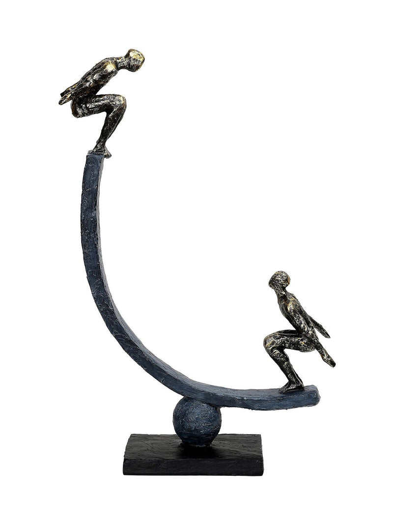Libra Interiors antique gold bronze balancing act figures sculpture (British brand)