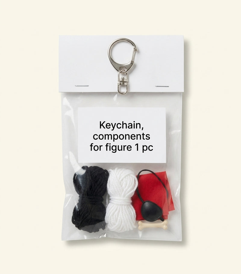 McQueen knitted doll charm hooded skeleton (British brand)