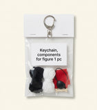 McQueen knitted doll charm hooded skeleton (British brand)