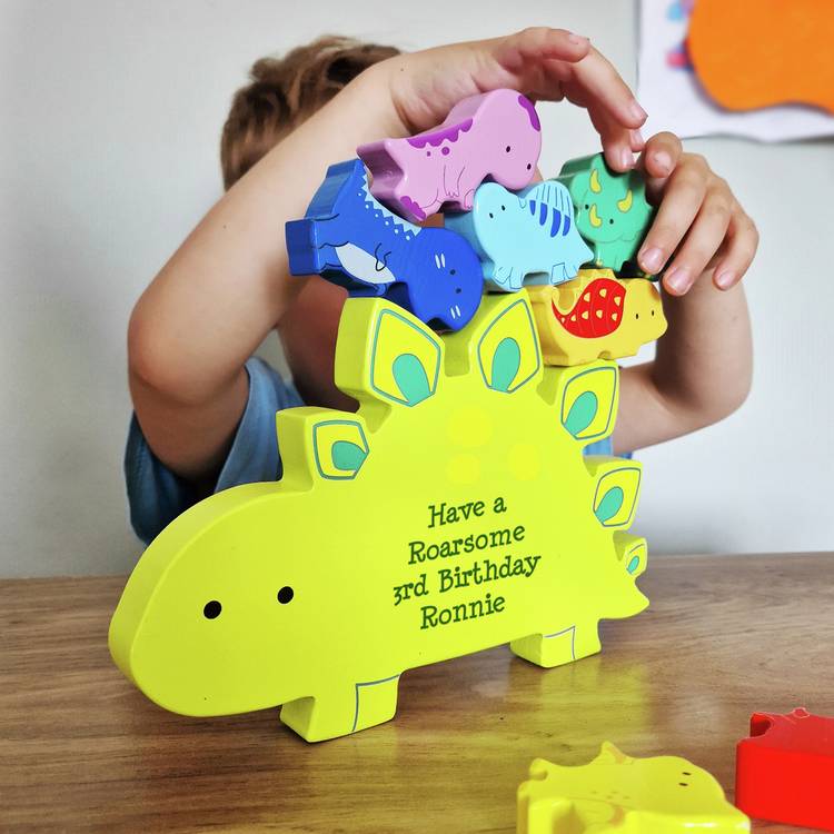 Personalised wooden dinosaur stacker toy, imported from the UK