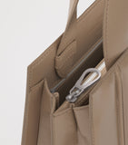 Max Mara small quilted Whitney top-handle bag, imported from the UK