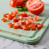 KitchenAid 3-piece cutting board set in green, imported from the UK