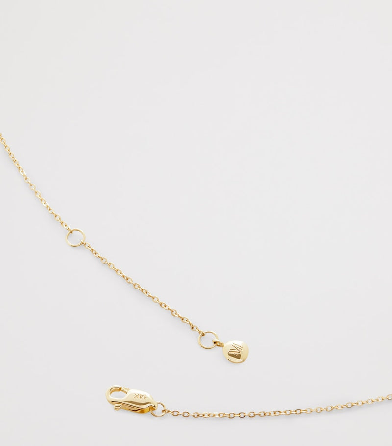 Monica Vinader yellow gold locket necklace, imported from the UK