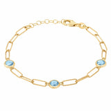 Round cut aquamarine paperclip bracelet 14ct yellow gold, UK version