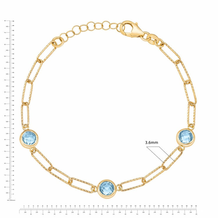 Round cut aquamarine paperclip bracelet 14ct yellow gold, UK version