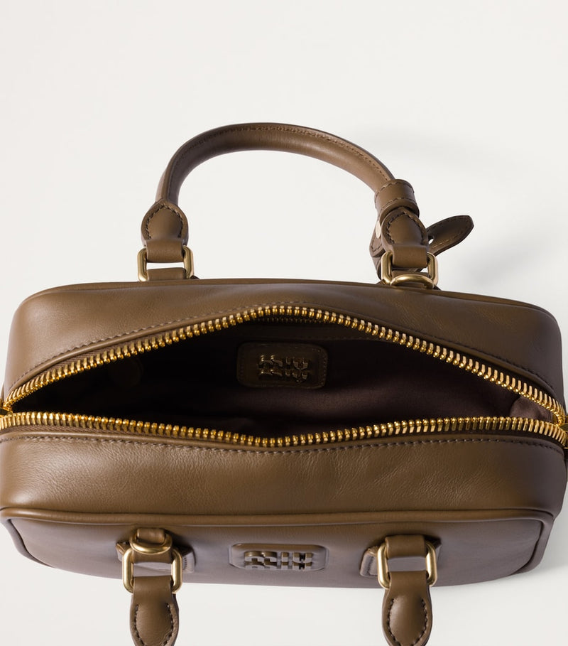 Miu Miu Arcadie top-handle bag, imported from the UK