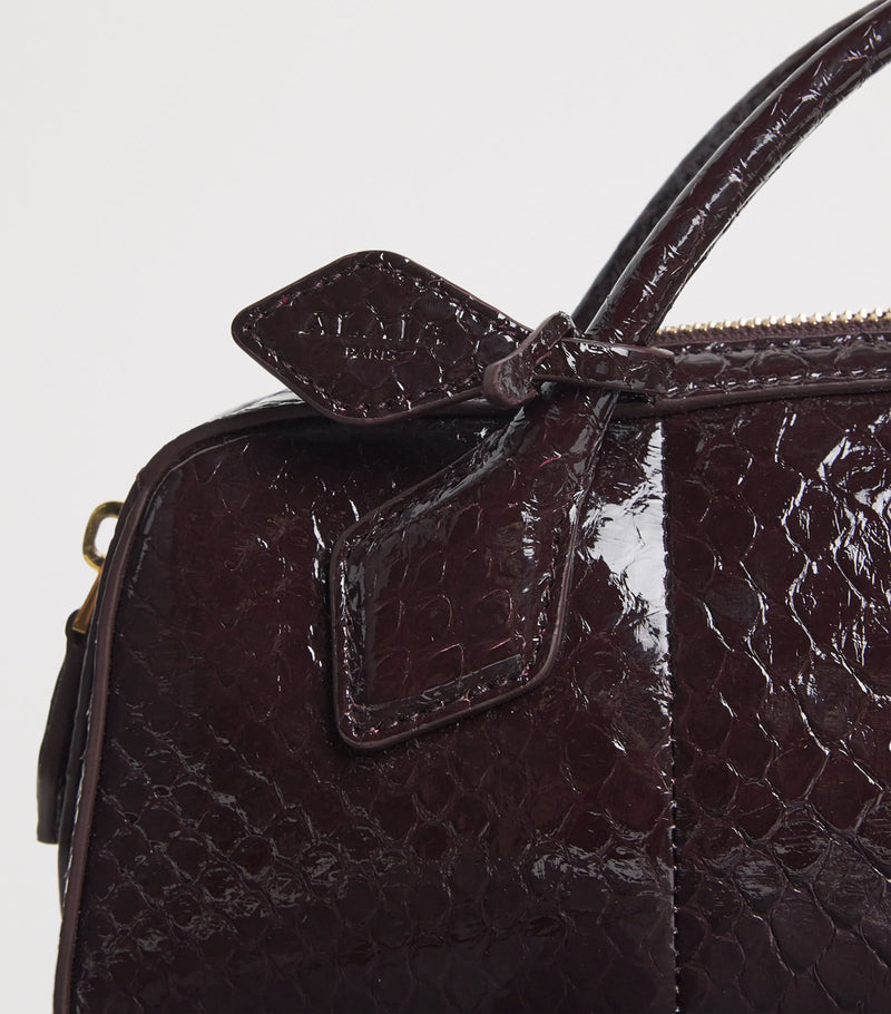 Alaïa snakeskin Le Teckel top-handle bag, imported from the UK