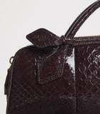 Alaïa snakeskin Le Teckel top-handle bag, imported from the UK