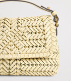 Anya Hindmarch woven leather Neeson cross-body bag, imported from the UK