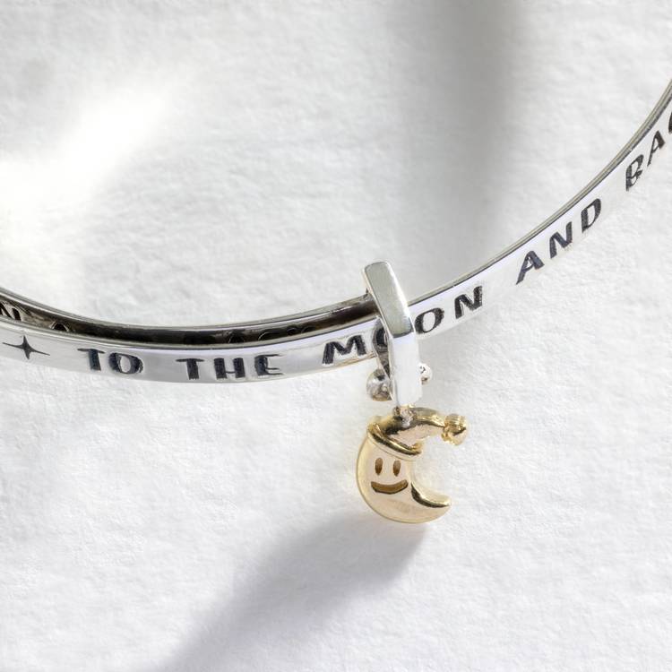 Revere baby bangle with moon and star charm (British brand)