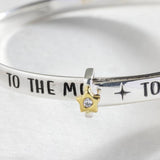 Revere baby bangle with moon and star charm (British brand)