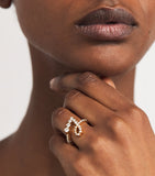 Sophie Bille Brahe yellow gold diamond initial ring (British brand)