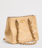 Valentino Garavani small lambskin Laseine tote bag, imported from the UK