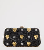 Valentino Garavani embellished minaudiere clutch bag - British product