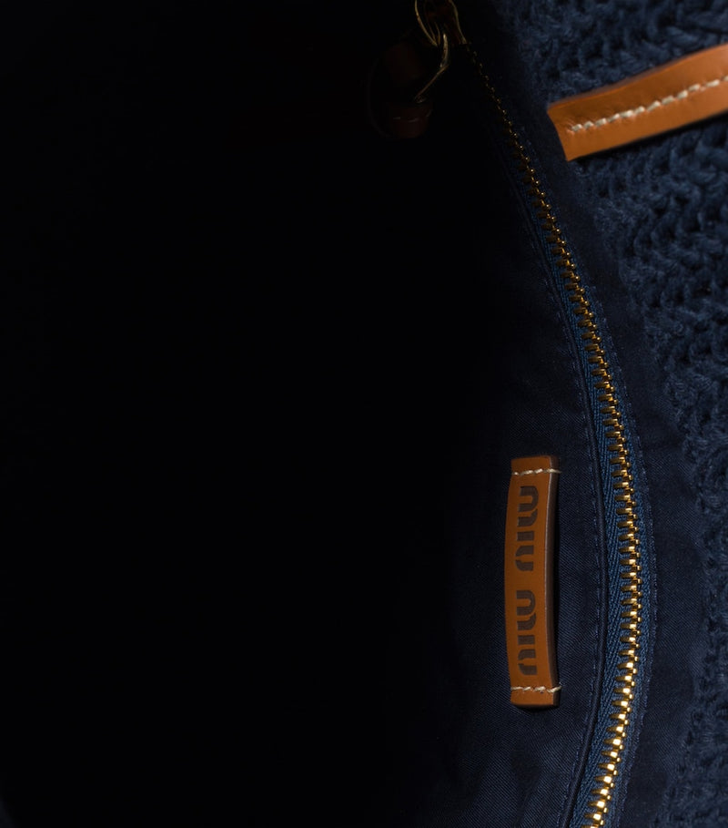 Miu Miu raffia-effect woven tote bag (British brand)