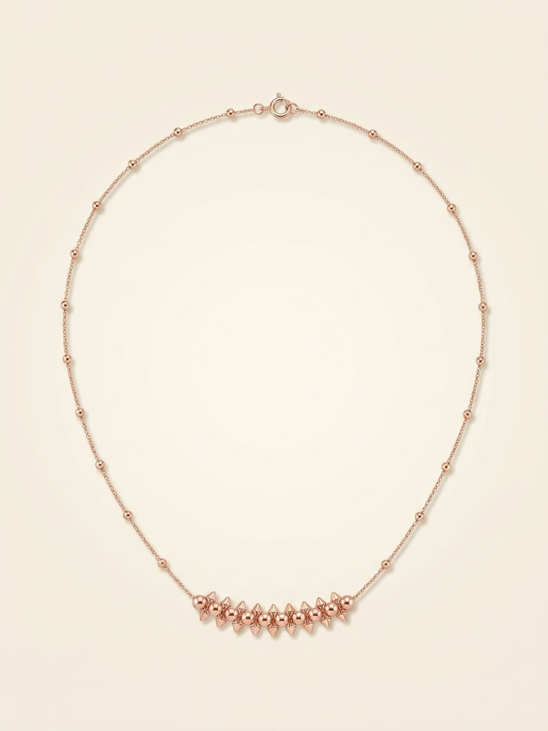 Cartier Clash necklace in 18ct rose gold with pink chalcedony (British brand)