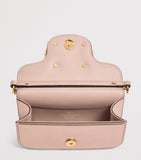 Valentino Garavani Small Leather Locò shoulder bag, imported from the UK
