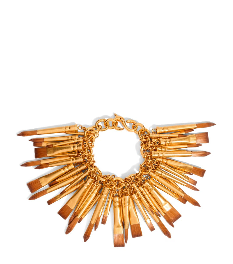 Schiaparelli gold-plated paintbrush bracelet (British brand)