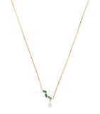 Astrid & Miyu yellow gold emerald diamond necklace, imported from the UK