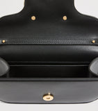 Valentino Garavani Locò small shoulder bag, imported from the UK