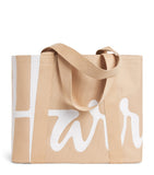 Harrods medium beige tote bag with embroidered logo, imported from the UK