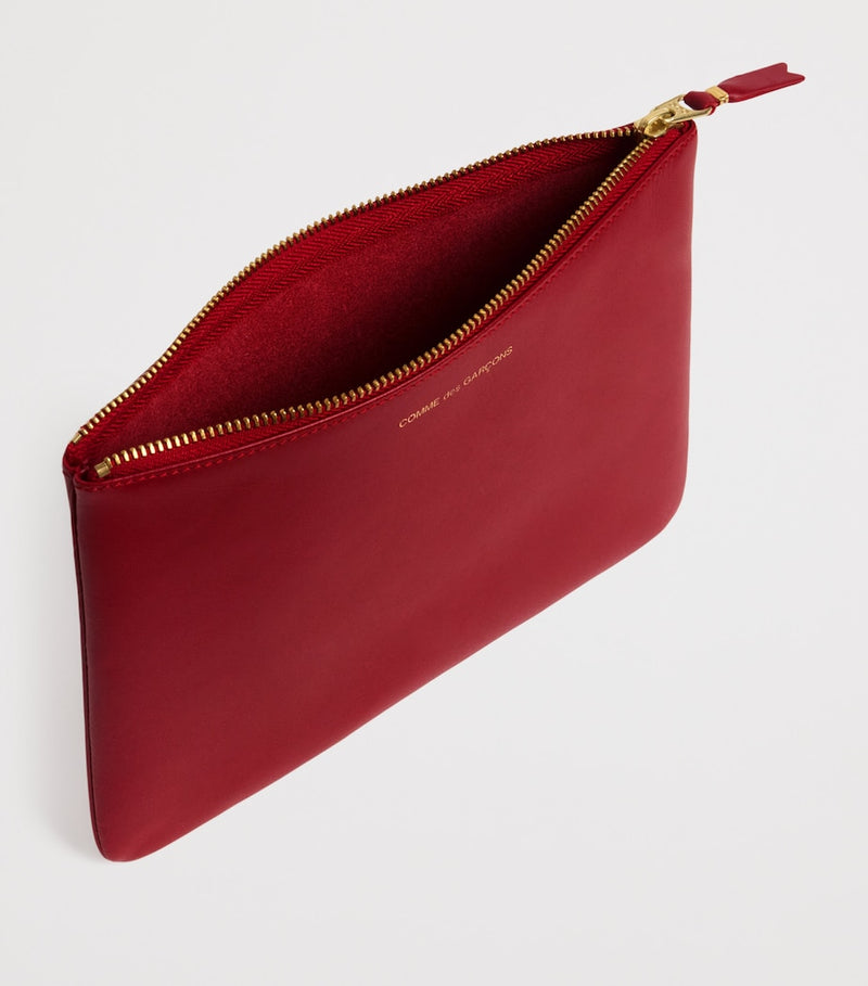 Comme des Garçons large leather zipped pouch - British product