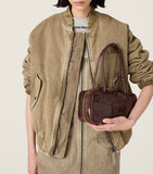 Miu Miu leather Beau patchwork top-handle bag, UK version