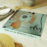 Personalised children's glass chopping board with drawing, imported from the UK