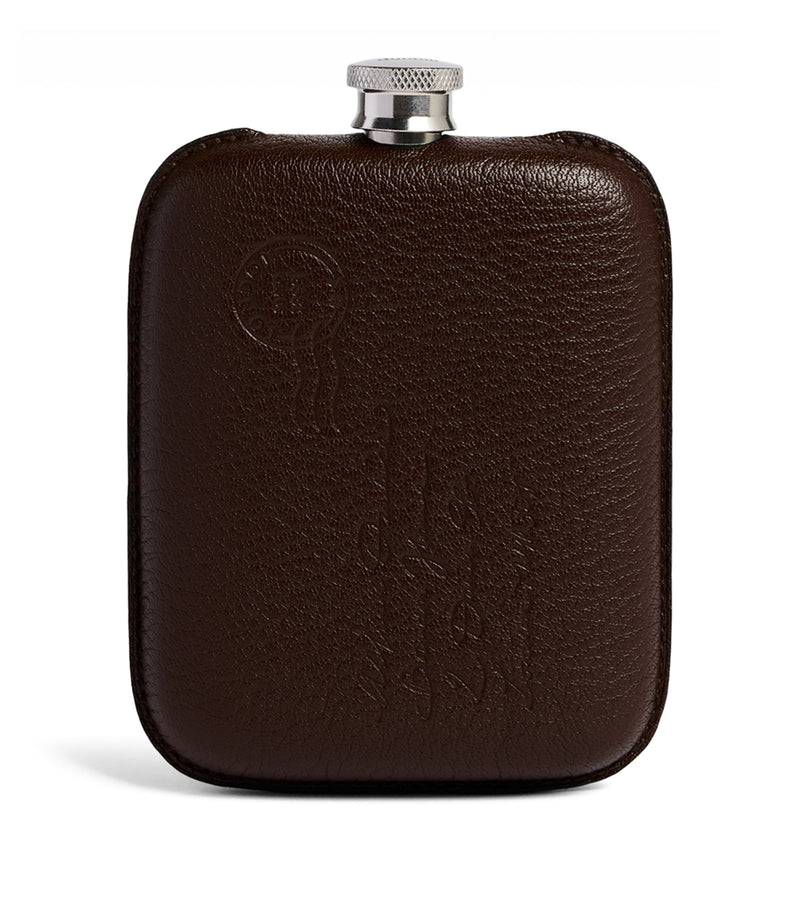Dunhill leather-wrapped flask (British brand)
