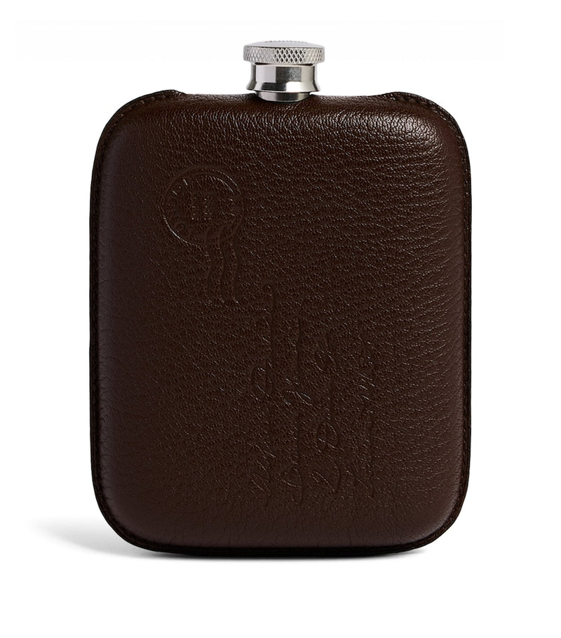 Dunhill leather-wrapped flask (British brand)