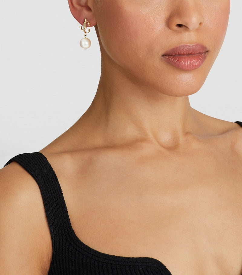 Jimmy Choo pearl earrings with resin pearl and JC monogram, UK version