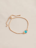 Gold tone birthstone pully bracelet, UK version