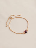 Gold tone birthstone pully bracelet, UK version