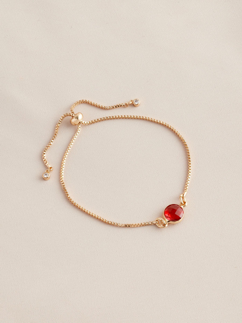 Gold tone birthstone pully bracelet, UK version