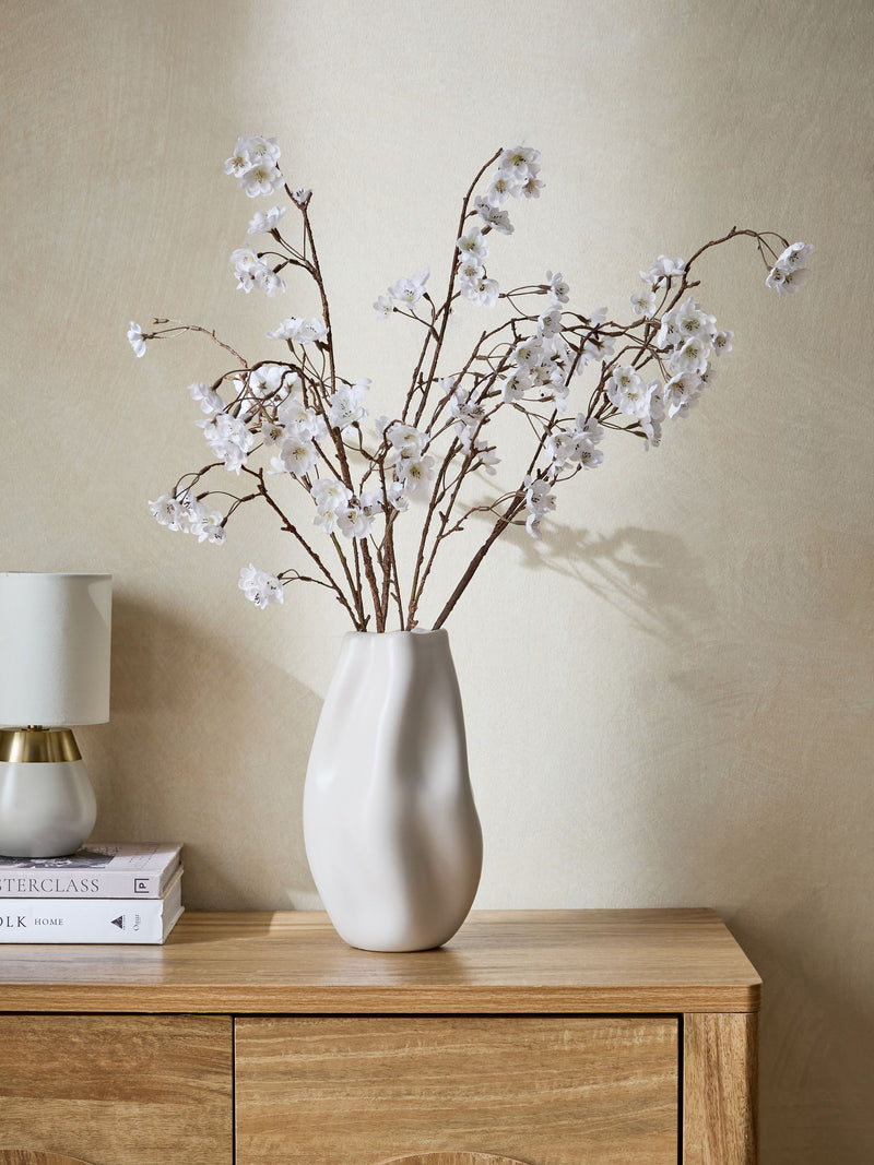 Artificial blossom stem arrangement in white ceramic vase 71cm height - British product