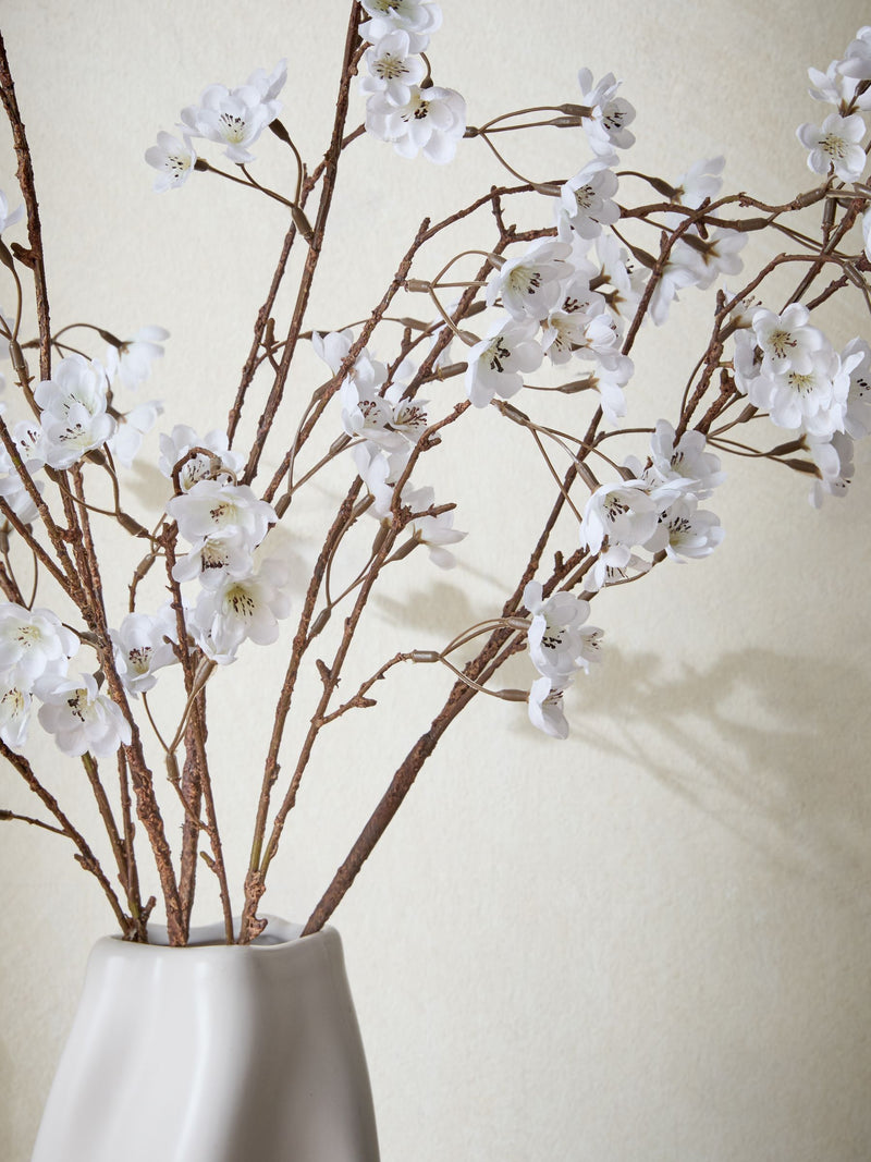 Artificial blossom stem arrangement in white ceramic vase 71cm height - British product