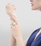 Bvlgari rose gold and ceramic B.zero1 four-band ring, imported from the UK