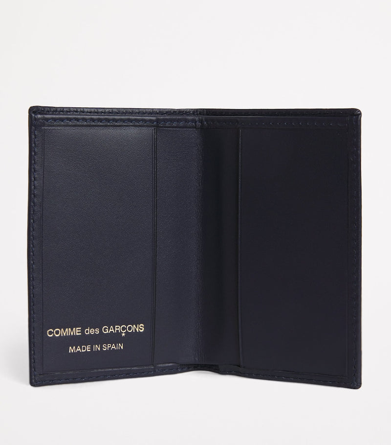 Comme des Garçons leather bifold card holder 10x7cm, imported from the UK