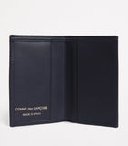 Comme des Garçons leather bifold card holder 10x7cm, imported from the UK
