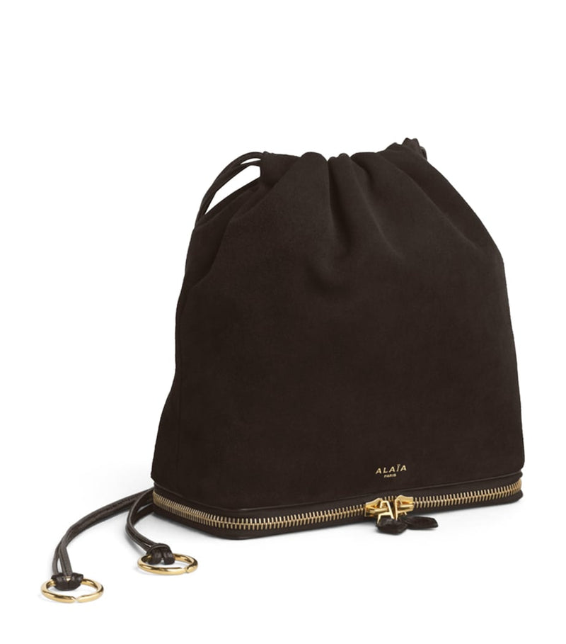 Alaïa Le Ponchon suede cross-body bag, imported from the UK