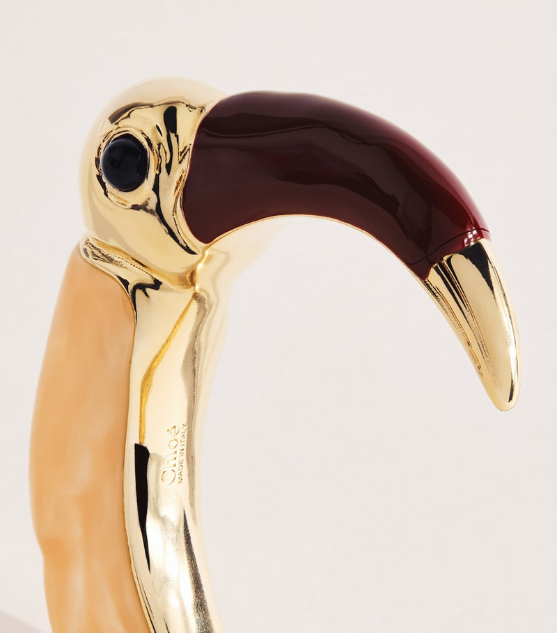 Chloé Toucan cuff bracelet Tropicus resin brass, UK version