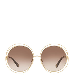 Round Carlina Sunglasses with Gradient Lenses and Spiral Design